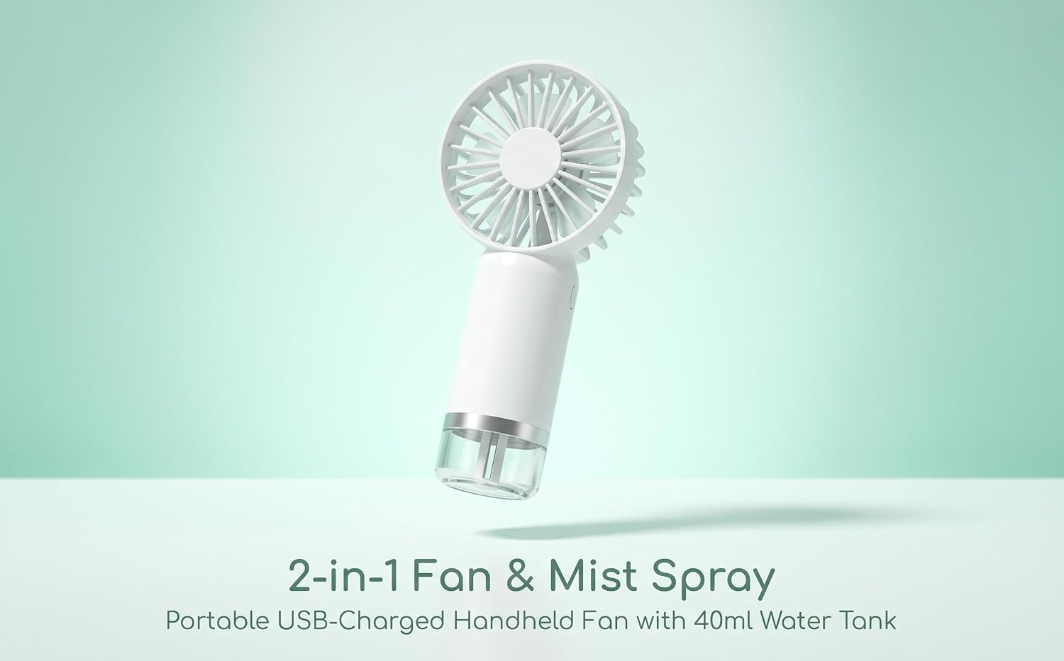 Text reads '2-in-1 Fan &amp; Mist Spray' and 'Portable USB-Charged Handheld Fan with 360s Water Tank.' White and transparent handheld fan device with misting spray function against mint green background.
