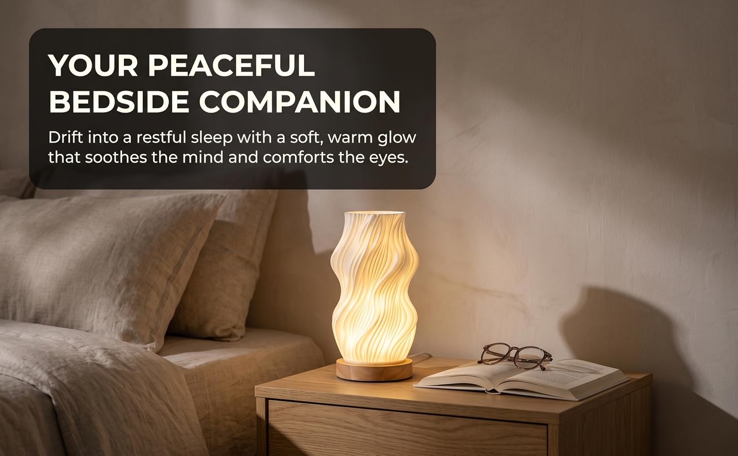 Text reads 'YOUR PEACEFUL BEDSIDE COMPANION' and 'DRP Pro is a restful sleep with a soft, warm glow that soothes the mind and comforts the eyes.' Warm glowing amber crystal lamp sits on nightstand beside book in bedroom setting.