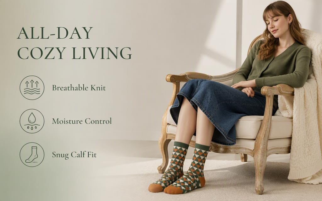 Text reads 'ALL-DAY COZY LIVING', 'Breathable Knit', 'Moisture Control', 'Snug Calf Fit'. Woman seated on wooden chair wearing olive-green long-sleeve top and dark pants with patterned socks, demonstrating comfortable cozy apparel.